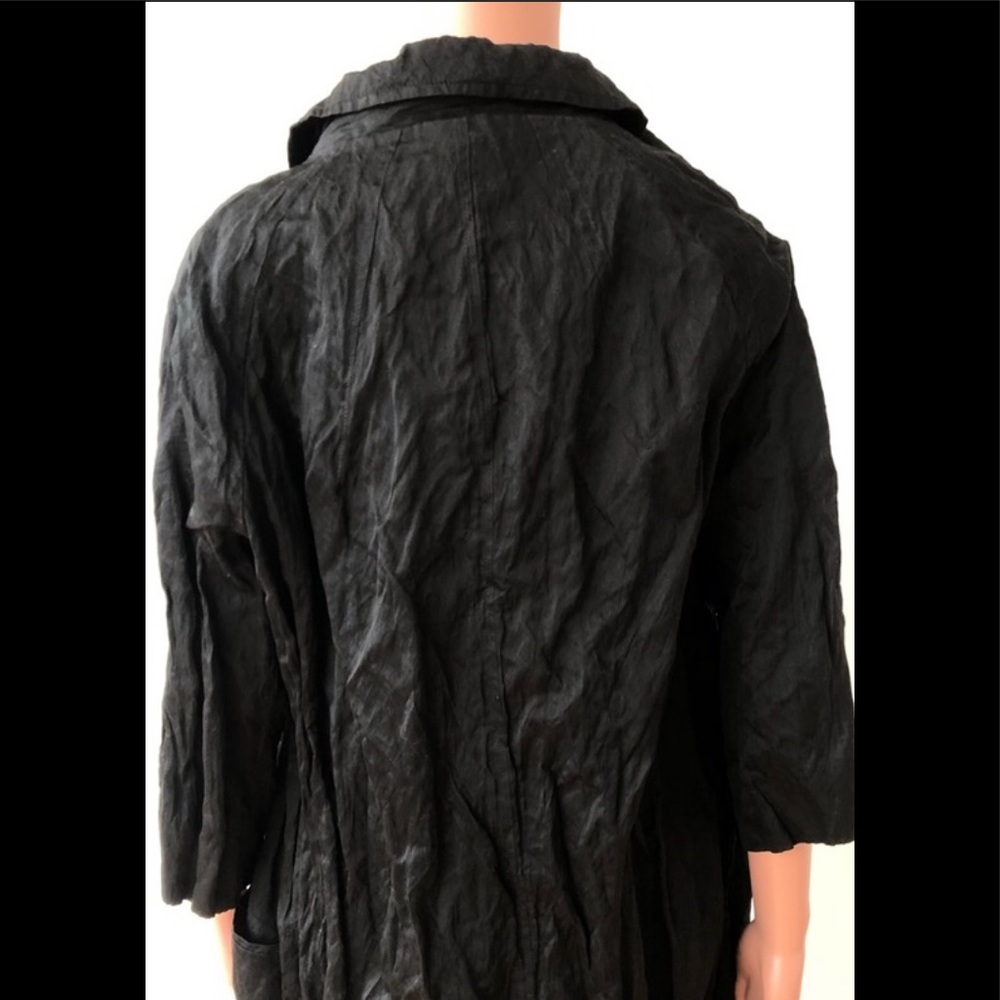 Timeless black Miu Miu coat.